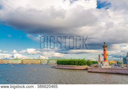 Strelka Arrow Of Vasilyevsky Island With Green Trees And Rostral Columns, Colorful Buildings On Emba