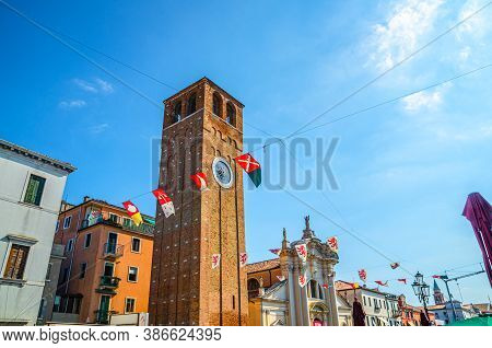 Chioggia, Italy, September 16, 2019: Chiesa Saint Andrea Catholic Church Building With Brick Bell To