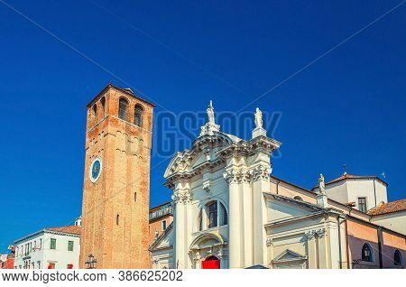Chiesa Saint Andrea Catholic Church Building With Brick Bell Tower In Historical Centre Of Chioggia 