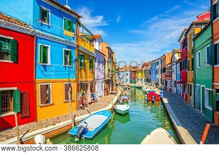 Colorful Houses Of Burano Island. Multicolored Buildings On Fondamenta Embankment Of Narrow Water Ca