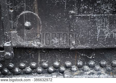 Background With A Gray Rough Worn Surface Close Up. Grunge Texture