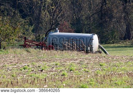 Various Old Vintage Retro Partially Rusted Abandoned Agricultural Farming Equipment Used To Work Wit
