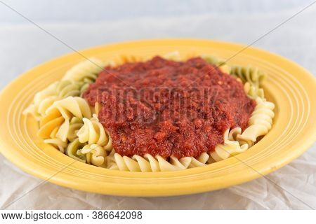 Healthy Serving Of Rotelli With Marinara Sauce In A Bowl To Complete A Delicious Meal To Eat.