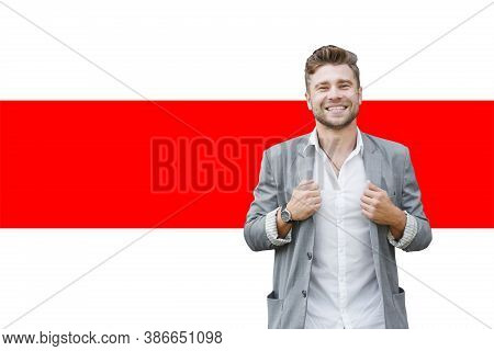 A Man Stands Against The White And Red Flag Of The Revolutionary Opposition In Protest Against The D