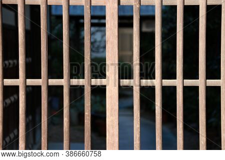 Wooden Fence Of Japanese House On Sunlight. Japanese Traditional Wooden Stockade Of Home On Sunshine