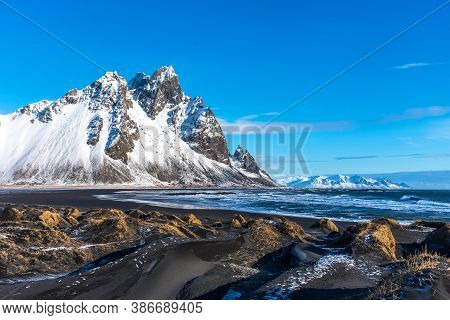 Aerial Winter Landscape View Of Vestrahorn And Black Sand Beach On The Stokksnes Peninsula In Southe