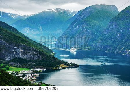 Breathtaking view of Sunnylvsfjorden fjord and cruise ship, near Geiranger village in western Norway. Landscape photography