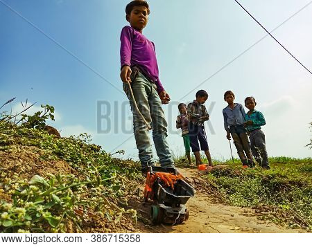 District Katni, India - January 01, 2020: Asian Poor Village Little Kids Playing Together At Country