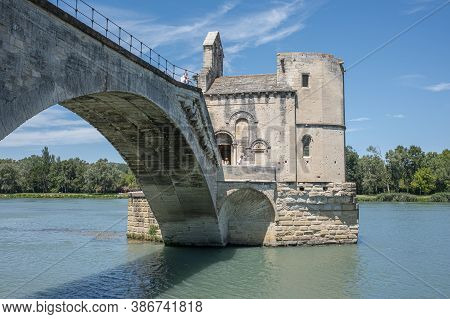 Avignon, France - July 7, 2020: The Pont Saint-benezet Also Known As The Pont Avignon Is A Famous Me