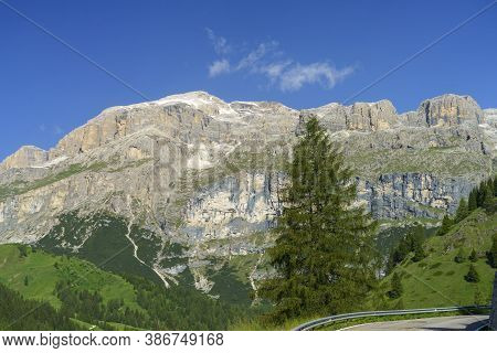Mountain Landscape At Summer Along The Road To Campolongo Pass, Dolomites, Belluno Province, Veneto,