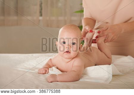 Massage The Newborn Close Up. Female Hands Massage Baby, Newborn Care Concept, Massage Of Abdominal 