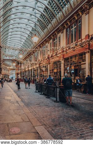 London, Uk - August 24th, 2020: People Socially Distanced At The New Moon Pub Tables Inside Leadenha