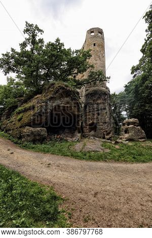Old Medieval Castle Tower Ruins By The Cellar In The Rock