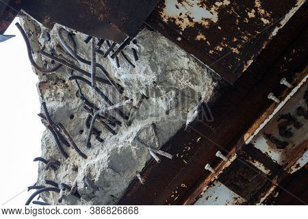 Destruction Of An Abandoned Structure. A Chip On A Monolithic Reinforced Concrete Floor. Metal Reinf