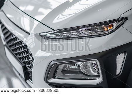 Close Up Picture Of A Shiny Grey Car Bumber