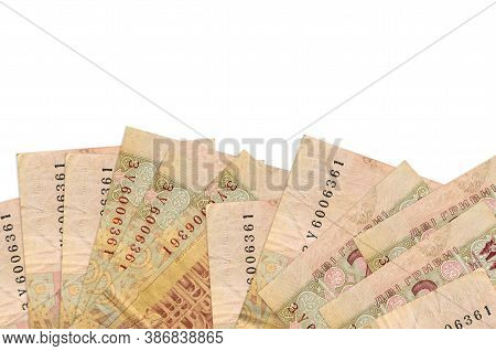 2 Ukrainian Hryvnias Bills Lies On Bottom Side Of Screen Isolated On White Background With Copy Spac