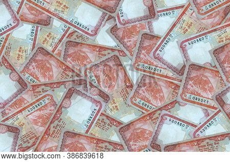 20 Nepalese Rupees Bills Lies In Big Pile. Rich Life Conceptual Background