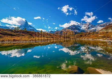Autumn Alpine Scenery With Matterhorn Peak Mirrored On The Smooth Water Of Leisee Lake, Sunnegga, Ze