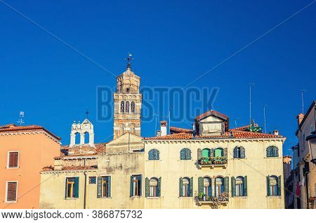 Campo Santo Stefano Square With Typical Italian Buildings Of Venetian Architecture And Santo Stefano