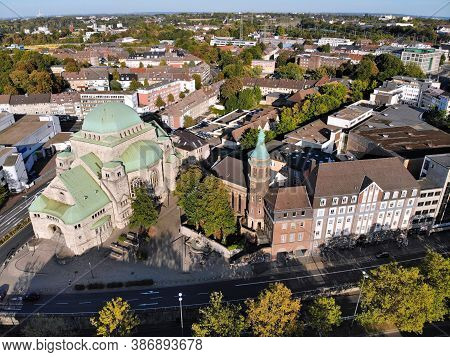 Essen City In Ruhr Region, Germany. Aerial View Of Old Synagogue And Friedenskirche Church.