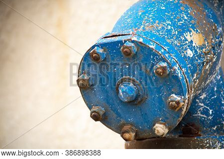 Blue Rusted Pipe Joint With Place To Attach More Pipes Shows High Diameter Indistrial Pipe Joint