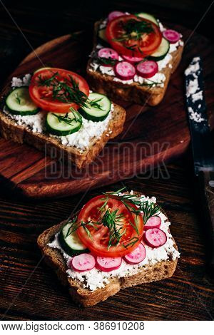 Vegetarian Sandwiches With Fresh Sliced Tomatoes, Cucumber And Radish