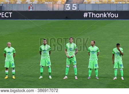 Kyiv, Ukraine - August 5, 2020: Vfl Wolfsburg Players Listen To Europa League Anthem Before Uefa Eur