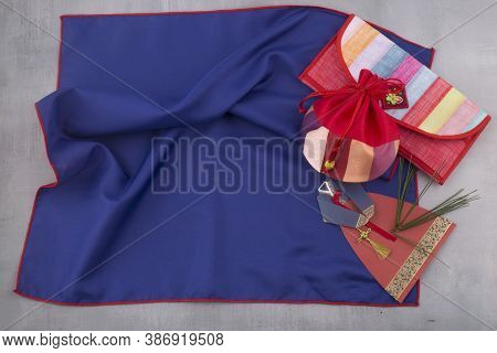 Korean Lucky Bag On Blue Traditional Wrapping Cloth.