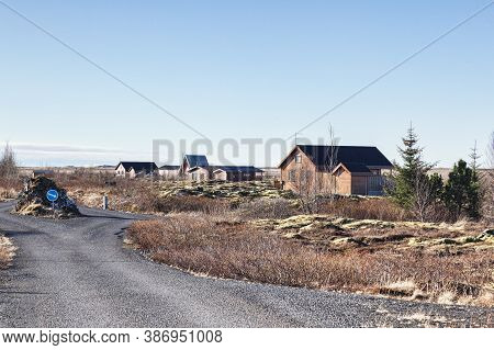 22 April 2018: Grimsnes, South Iceland - Icelandic Summerhouses On A Clear Morning.