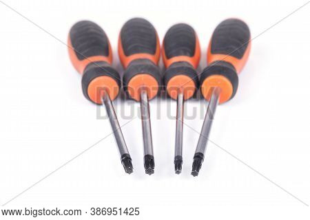 Set Of Torx Screwdrivers On A White Background
