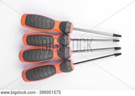 Set Of Torx Screwdrivers On A White Background