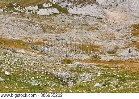 Mountain Landscape - A Beautiful Green Mountainside Covered With Numerous Karst Sinkholes