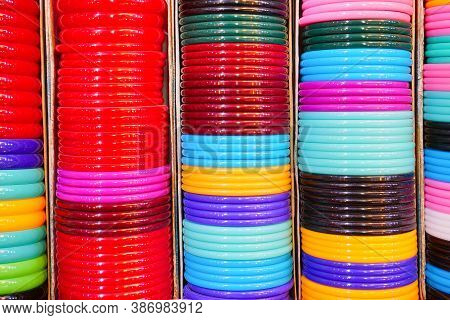 Haridwar, Garhwal, India - 3rd November 2018 : Colourful Bright Bangles Displayed For Sale. Night Im