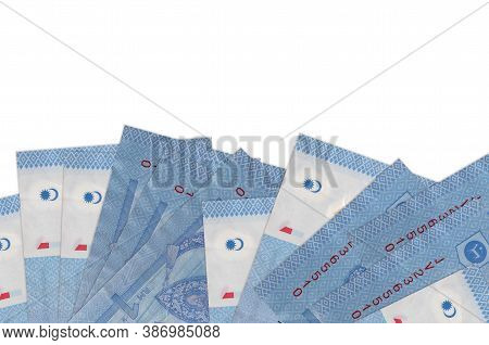 1 Malaysian Ringgit Bills Lies On Bottom Side Of Screen Isolated On White Background With Copy Space