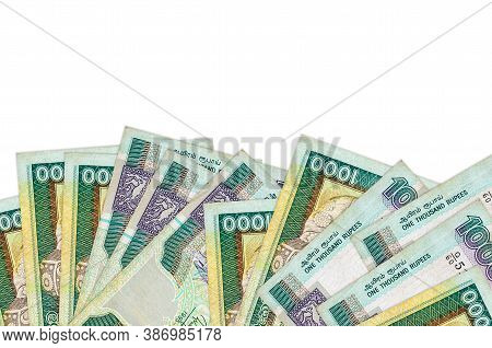1000 Sri Lankan Rupees Bills Lies On Bottom Side Of Screen Isolated On White Background With Copy Sp