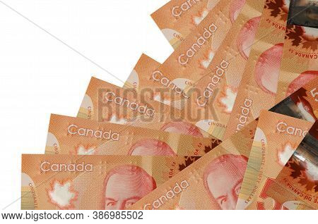 50 Canadian Dollars Bills Lies In Different Order Isolated On White. Local Banking Or Money Making C