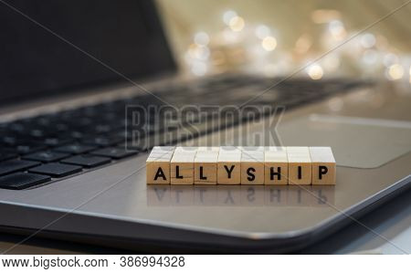 Allyship Letter Blocks Concept On Laptop Keyboard
