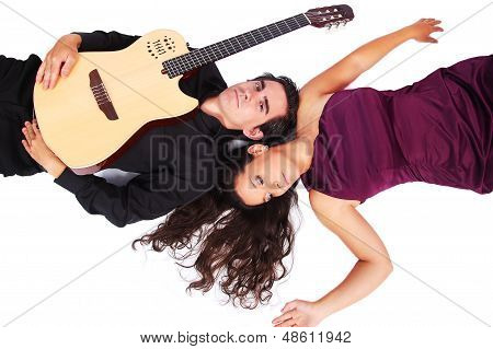 A Female Singer And A Male Guitarrist