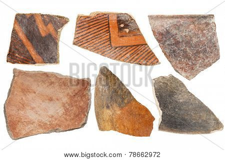 ancient Native American Indian (Anasazi) artifacts, six pottery shards  isolated on white