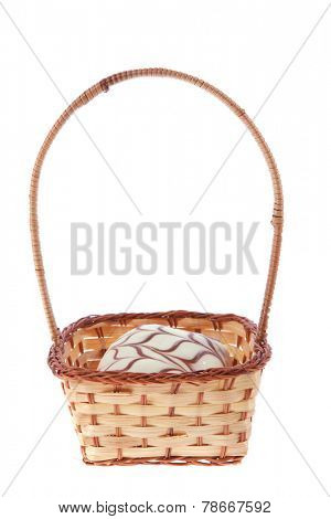 traditional jewish holiday chanuka donuts covered by dark and white chocolate pattern on retro vintage basket isolated on white background