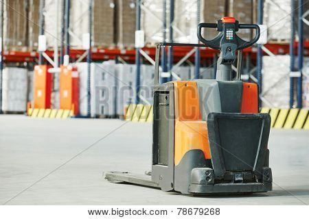 Manual forklift pallet stacker truck equipment at warehouse