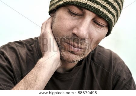 Man With Swollen Face Suffering From Toothache