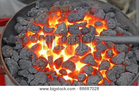 Hot Ingot Iron Working In The Workshop Of Blacksmith