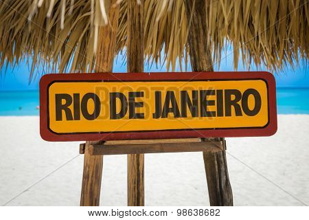 Rio de Janeiro sign with beach background