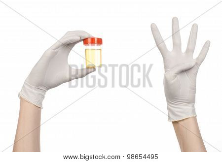 Medical Theme: Doctor's Hand In White Gloves Holding A Transparent Container With The Analysis Of Ur