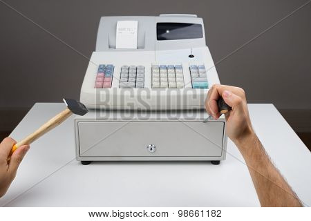Person Hands With Worktool And Cash Register