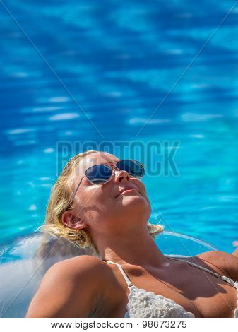 Top view of a  girl in the swimming pool