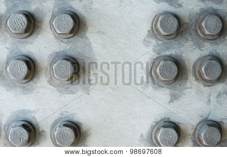 Gray Metal Surface With Hexagonal Bolt Heads