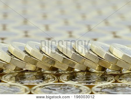 Fallen Stack Of New Pound Coins From The Uk.