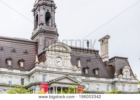 Montreal, Canada - May 27, 2017: Old Town Area With Hotel De Ville City Hall Closeup Of Clock And To